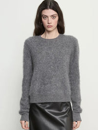 Close front view of the Enza Costa Mink Wash Cashmere Easy Crew in Pewter showing the crewneck and ribbed cuffs.