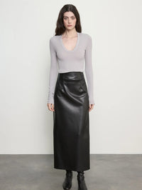 Full front view of the Enza Costa Fluid Silk Rib Essential U Top in Light Grey with a black leather midi skirt.