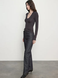Side view of the Enza Costa Silk Rib Essential U Top in Phantom, fitted through the body with long sleeves.
