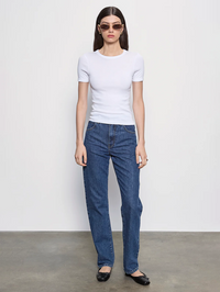 Front view of the Supima Cotton Perfect Tee in white by Enza Costa, styled with denim jeans