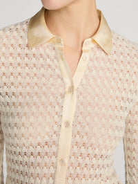 Close-up of the silky collar and buttons on the FRAME Bubble Stitch Shirt in Cream