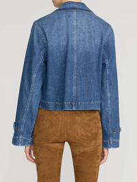Back view of the Denim Uniform Trench in Girlfriend by FRAME with cropped silhouette