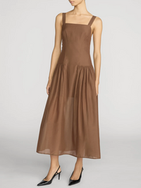 Front view of the Garden Dress in Moss Brown by FRAME with gathered skirt detail and square neckline