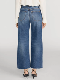 Back view of The Swing Jean in Lucky Raw After by FRAME, featuring a wide-leg silhouette with raw hem