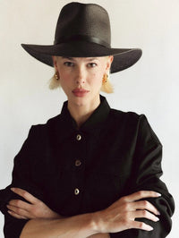 Front view of the Sherman Hat in black by Janessa Leone with wide brim and woven band detail