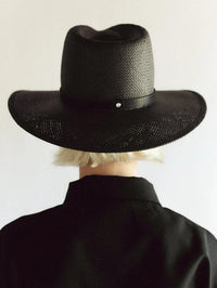 Back view of the black Sherman hat by Janessa Leone with woven texture detail