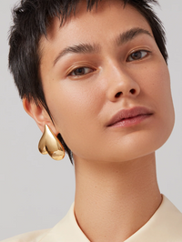 Mega Art Heart Button Earrings in High Polish Gold by JENNY BIRD - View 4