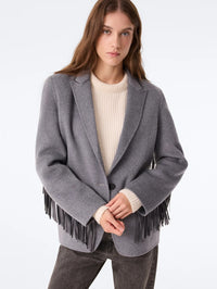 Front view of model in the KUJTEN G3 cashmere blazer in Flannel Gray with leather sleeve fringe