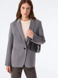 Three quarter view of the KUJTEN G3 cashmere blazer in Flannel Gray showing patch pockets and fringe