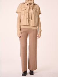 Front view of the Jessinda Jacket in latte by Kujten, styled with a ribbed turtleneck and matching pants
