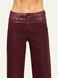 Waistband and front pocket detail of the L'AGENCE Clayton coated pant in Deep Sangria Coated