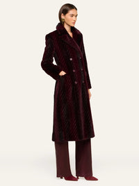Side view of the L'AGENCE Icelyn Long Coat in Burgundy/Dark Burgundy showing the long length