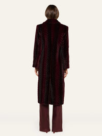 Back view of the L'AGENCE Icelyn Long Coat in Burgundy/Dark Burgundy braid jacquard faux fur