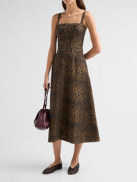 Front view on model of the L'AGENCE Jovie Bustier Midi Dress in Zephyr showing the A-line skirt.
