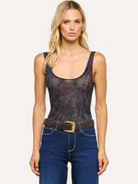 Front view of the L'AGENCE Kalea Mesh Bodysuit in Midnight Multi Lux Paisley tucked into wide leg jeans.