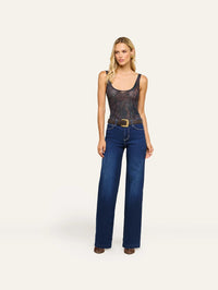Full length look with the L'AGENCE Kalea Mesh Bodysuit in Midnight Multi Lux Paisley and dark wide leg denim.