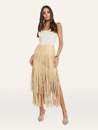 Full-length front view of the L'AGENCE Karolina Fringe Skirt in Croissant styled with a white tank.