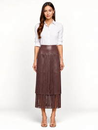 Front view of the Karolina Fringe Skirt in Dark Malbec by L'AGENCE, styled with white button-up shirt