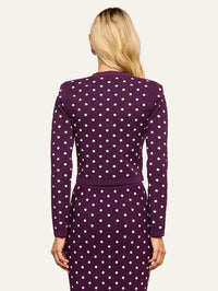 Back view of the cropped L'AGENCE Kota Jacquard Cardigan in Dark Plum/Ivory Polka Dot