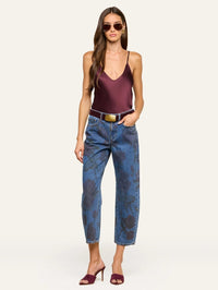 Full-length styled view of the L'AGENCE Lexi Silk Camisole in Deep Sangria with sunglasses