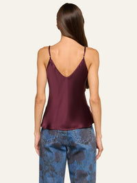 Back view of the L'AGENCE Lexi Silk Camisole in Deep Sangria worn untucked