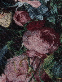 Close-up of the rose tapestry jacquard on the L'AGENCE Marseille Mini Skirt in Black Multi Rose Vase Tapestry