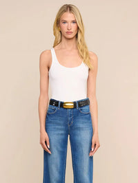 Front view of the Nica Tank Bodysuit in white by L'AGENCE, styled with high-waist denim jeans
