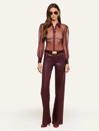 Full-length look with the L'AGENCE Sophie Swiss Dot Blouse in Deep Sangria and wide-leg burgundy pants