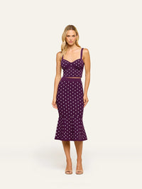Full-length view of the L'AGENCE Tula Knit Bra Top in Dark Plum/Ivory Polka Dot styled as a matching set