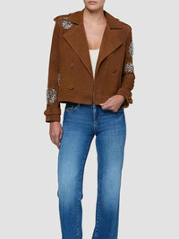 Cropped L'AGENCE Xoey Crystal Cropped Trench in Walnut styled open over blue jeans.