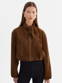 Front view of the LAMARQUE Anita Suede Bomber Jacket in Brown with the scarf collar tied at the neck.