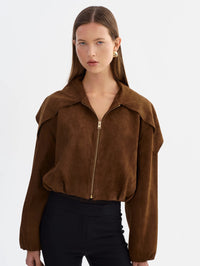 Front view of the LAMARQUE Anita Suede Bomber in Brown worn with the wide collar open and untied.