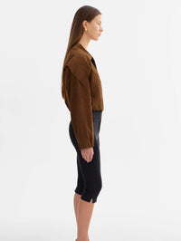 Full-length side view of the LAMARQUE Anita Suede Bomber Jacket in Brown showing the cropped length.