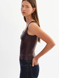 Side view of the LAMARQUE Cesia stretch leather tank in Vamp showing its close fit.