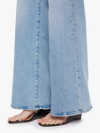 Detail view of the cropped hem on the Lil Hustler Roller Sneak Jean in I Confess by MOTHER