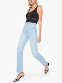 Full-length view of the Tippy Top Utensil Sneak Jean in Dots by MOTHER, paired with a black tank top