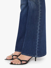 Close-up of the clean flare hem on the MOTHER Weekender Jean in Backstage Pass