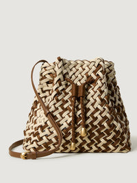 Front view of the NAGHEDI Gramercy Bucket Double Weave in Carmel, a brown and cream woven bucket bag.