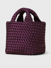 Side angle of the NAGHEDI St. Barths Petit Tote Satin in Bisou showing the glossy woven texture.