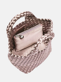 Interior view of the St. Barths Petit Tote in lavender satin by Naghedi, showing woven details and zippered pouch