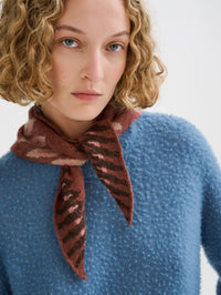 Close up of the knotted Roberto Collina alpaca Fair Isle Bandana in Brown with pink jacquard