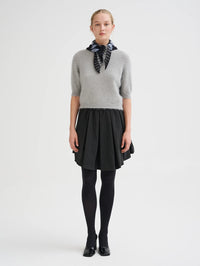 Full length look with the Roberto Collina Fair Isle Bandana in Grey and a pleated black skirt