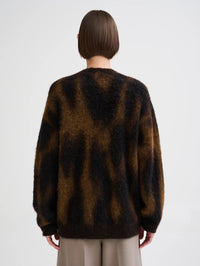 Back view of the Roberto Collina oversized animal jacquard cardigan in Brown
