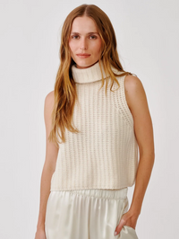 Front view of the Saige Cropped Turtleneck in Gardenia by SABLYN, featuring ribbed knit texture