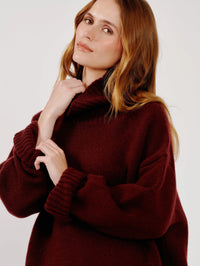Close-up of the mock neck and chunky cashmere knit on the SABLYN Scarlett Sweater in Cabernet