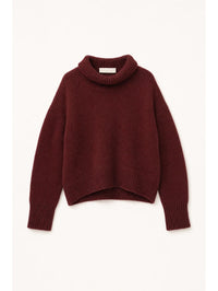 Flat lay of the SABLYN Scarlett Slouchy Mock Neck Sweater in Cabernet with rolled mock neck and ribbed hem