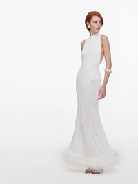 Side view of the Self-Portrait White Racer Back Feather Knit Midi Dress showing the flared feather trim.