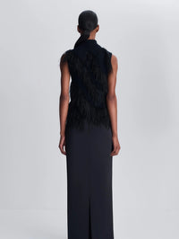 Back view of the SIMKHAI Elinor Feather Top in Black showing ostrich feathers across the back.