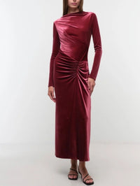 Angled front view of the SIMKHAI Ferrera velvet midi dress in Lipstick with strappy sandals.