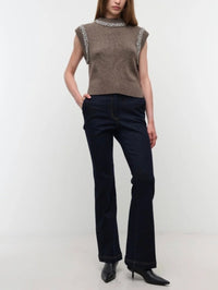 Relaxed front pose in the SIMKHAI Joanae Embellished Pullover in Birch Melange with embellished trim.
